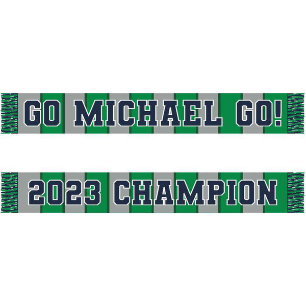A custom knit scarf featuring a multi-color stripe pattern with text that reads 'GO MICHAEL GO! 2023 CHAMPION' along with a logo.